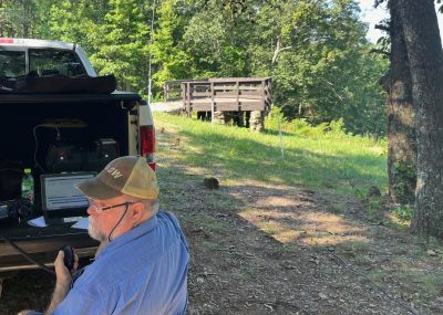 We activated Johns Mountain WMA US-3758 on Wednesday July 9 2025 from the overlook site. It was hot but there was as usual a breeze to make it barrable.

Allen KN4FKS set his usual end fed wire antenna and worked 40 meters SSB. He had 77 contacts with 6 park to park contacts and just 1 Canadian contact. John KB4QXI had 59 contacts with 18 P2P's on 20 meters SSB using his rooftop ham stick. Danny AG4DW set his 'POTA Performer' vertical  and worked 17 meters with 8 SSB contacts and 62 FT8 contacts. He had several DX contacts 1 to Spain, 2 to the Dominican Republic and 4 to Canada. 

The handy thing about operating from the overlook is that you can keep an eye on the developing weather to the west. When we arrived there was not a cloud in the sky. Then a line of small puffy clouds developed over the far ridgeline. Then as the morning moved into afternoon the clouds got bigger and then darker. About 1:30 we noticed a few far off static crashes. My shade moved and I was about to be in full sun. Enough fun, time to pack up and call it a day. We all got packed up and off the mountain then ran into heavy rains on the way home. Excellent timing. Fun day.
