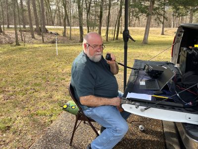 This week the space weather was clear but the terrestrial weather was less than ideal even though it was 70 degrees in February.  This Thursday we activated the Chickamauga Battlefield from the usual picnic area on Alexanders Bridge road.

It was a warm day Thursday and Allen KN4FKS set up at one of the picnic tables. He set his 17 ft. vertical with the Chameleon Faraday cloth radials and started on 15 meters SSB. As usual it was slow but open for DX. Slovenia, Canada, Spain, and a booming signal into Sweden. He also had a Park to Park to the Bahamas. Moving to 20 meters he had 11 more Park to park contacts. The total was 21 contacts for the day. In the middle of the morning a dark cloud came over and it began to sprinkle rain. A handy poncho quickly covered the gear but not quite fast enough. Computer touch pads do not like to get wet. Solution: dry it off best you can and break out the paper log! It was fine later. Luckily the shower quickly ended but dark clouds kept threatening all day.  

Danny AG4DW was better prepared with his big blue umbrella mounted off his trailer hitch. Using his POTA Performer antenna, Danny Made 36 SSB contacts on 40 and 17 meters SSB then Made 24 FT8 contacts on 17 meters for a total of 60 contacts with DX to Italy, Poland and Canada. 

Ed KM6UTC set up in his back seat ham shack and made 42 contacts on 20 meters all US contacts. Thanks for the official POTA timepiece. 

Dan K2DTS couldn't make it Thursday so he came on Friday and made 83 contacts on 20 meters, 72 SSB and 11 FT8. He reports he is becoming more comfortable handling the POTA pileups. It is fun when you can just roll and the other operators cooperate. Dan is also closing in on that KILO for the Battlefield so Friday helped him get closer. 

By the way in the DX world the Bouvet Island DXpedition 3YOK is getting closer to arrival. This uninhabited island in the extreme south Atlantic is #10 on the all time DX list. Costing $1.5 million dollars to attempt it should be epic. They will always be operating 'split' and the pileups will be unbelievable, listen in and later during their stay as the big guns have all worked them there is a chance of actually getting through on one of the bands.  Their website is  https://3y0k.com/#bouvet-island  after they arrive they will post their bandplan and give frequencies to be on the lookout for. Keep and eye on the DX spot pages as well. Good DX,


