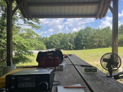 This past Thursday June 11, we activated Cloudland Canyon State Park from the Nickajack Trailhead site. The new concrete driveway was a welcome relief from the old bumpy gravel hill.

Allen KN4FKS set up under the picnic shelter and deployed his end fed half wave wire into a nearby pine tree. The rough bark nearly snagged his throw bag string but careful maneuvering finally got everything working. He then made 68 SSB contacts with 20 being on 20 meters and 48 more on 15 meters. He made 23 Park to Park contacts with 4 DX contacts to Slovenia, Canada, Mexico, and Brazil. While on 15 meters Allen heard a DX call, it was HF0PAS at the Polish Antarctica research station. He was working split because of the pile up coming from both Europe and North America. Try as he will 100 watts and a wire was not going to bust that pile up on this day. The cool thing if he had made the contact it would have been a P2P contact as that part of the continent is designated as a park with a POTA number. 

John KB4QXI set up his roof mounted Hamstick on 20 meters and made 63 SSB contacts with 19 P2P as well.

Danny AG4DW set up his Pota Performer 17 ft. vertical with the elevated counterpoise and made 68 contacts, 34 SSB and 34 FT8 on 40, 30, and 17 meters. He had 9 P2P contacts and 3 DX to Canada. 

Alan W4PLP came by just to visit everyone for a while and give encouragement. 

Soon after we had arrived a young couple showed up at the trailhead to go hiking and the lady expressed having an interest in Ham radio over the years. So, quickly we gave her a tour of Danny's set up and explained about the different facets of the hobby. Luckily we had prepared information sheets to give her concerning an introduction to ham radio, an overview of the TSARC and what POTA is all about. Hopefully we'll see this young hiker again on the radio. We are all ambassadors so it is helpful to always be prepared with a smile and information. 

