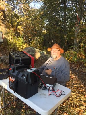 On late Monday afternoon (Oct 23, 2023) we gathered at the Johns Mountain WMA (K-3758) overlook to activate the park, cook a hotdog and watch the sunset. All three objectives were met. We set up three stations and played radio! Danny AG4DW made 43 SSB contacts with 3 P2P, 2 Alaska and one Venezuela mostly on 15 meters. John KB4QXI made 61 contacts with 9 P2P, 5 Canadian contacts plus one North Africa and one Venezuela mostly on 20 meters. Peter KX4BE made 20 contacts on CW with one FM contact for DX he had 2 Japan and one Chile. Allen KN4FKS had 12 contacts with 5 FM contacts on 70 cm. The other 7 were on 40 meters. 

As it got close to sundown at about 7 pm we took a break for supper and to watch the sunset from the overlook. We had hotdogs with the fixins cooked over charcoal, chips, macaroni salad, and smores for desert. There was supposed to be another desert cooked over the fire but someone (Karen KX4KM) forgot the essential ingredient, butter. We were assisted by our mascot dog I4ZZY. 

The sunset was spectacular and the company was the best. Thanks to all the hunters who make our fun possible. 
