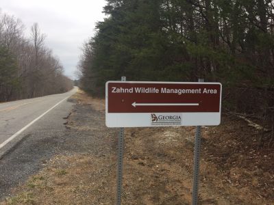 This Thursday Feb. 22 we activated the Zahnd WMA K-7903 which is in the middle of nowhere on the South end of Lookout Mountain.  The small wildlife area consist of woodland, cliffs, and large sandstone boulders. The only public facility is a 10 car gravel parking lot just off the side of GA Hwy 157 south of Hwy 136.

Allen KN4FKS set up his station using an end fed half wave rigged as a sloper. on 20 meters and had 61 contacts, 11 P2P, and 3 DX.  Ed KM6UTC set up his mag loop antenna and worked digital on 40 meters with 40 contacts, 4 P2P, and 14 DX. Ed was "slightly" delayed getting on the air searching for his cell phone which was hiding under his wallet in his back pocket.  John KB4QXI set up his Ham Stick on top of the car and made 7 contacts on 40 meters and 25 on 20 meters with 12 P2P contacts.  Danny AG4DW  used the end fed rig to make 19 contacts with 3 contacts back to back from Spain, then 1 Mexico and 1 Canadian.

While there we had occasion to introduce two rock climbers and two hikers to Ham radio and POTA.  Before we left Allen and Ed crossed the highway and walked a short distance to the top of the cliff line overlooking McLemore Cove and Pigeon Mountain to the East.  The view is amazing even on an overcast day.  Fun day once again.
