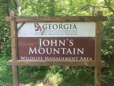 We activated Johns Mountain WMA US-3758 this Thursday from the overlook site on top of the mountain. The breeze kept up so the day didn't get too hot. Allen KN4FKS had 61 SSB contacts on 20 meters, 14 P2P and 6 DX with one P2P to the Dominican Republic and 5 Canadian stations. Ed KM6UTC had 58 digital  FT8 contacts with 9 DX contacts and three contacts in a row to Indonesia. John KB4QXI had 11 contacts with 1 P2P. Danny had 16 contacts on 2 meters, 70 cm, 20 Meters and 15 meters. He had a DX SSB contact with Saint Petersburg Russia. 

As usual at the overlook we had several visitors. First was the US Forest Service radio service technician checking on their repeater site 100 yards from the parking lot. They had erected a chain link fence around the tower and repeater house to hopefully slow down the copper thieves who steal the grounding wires from the tower legs and the radio equipment. Sad but true. We also had a Pinhoti Trail long distance hiker stop by and we helped him resupply his water bottles. ( He's in the background of one of the photos.) As we were getting ready to leave and elderly gentleman drove up and he was actually a HAM operator from the Villanow area. I didn't get his call sign but we had a nice chat. 

Then even the drive home was eventful. Danny's truck kept overheating and he had to stop and cool down several times to limp home. Probably a water pump issue. Allen got within a mile of home and Winston just sputtered and quit running. It wasn't the heat it simply is not getting spark for some reason. Karen came and towed Winston home. Sort that out later when it cools off a bit. I hope Ed and John made it home without incident there seems to be a trend starting here. I hope not. 
